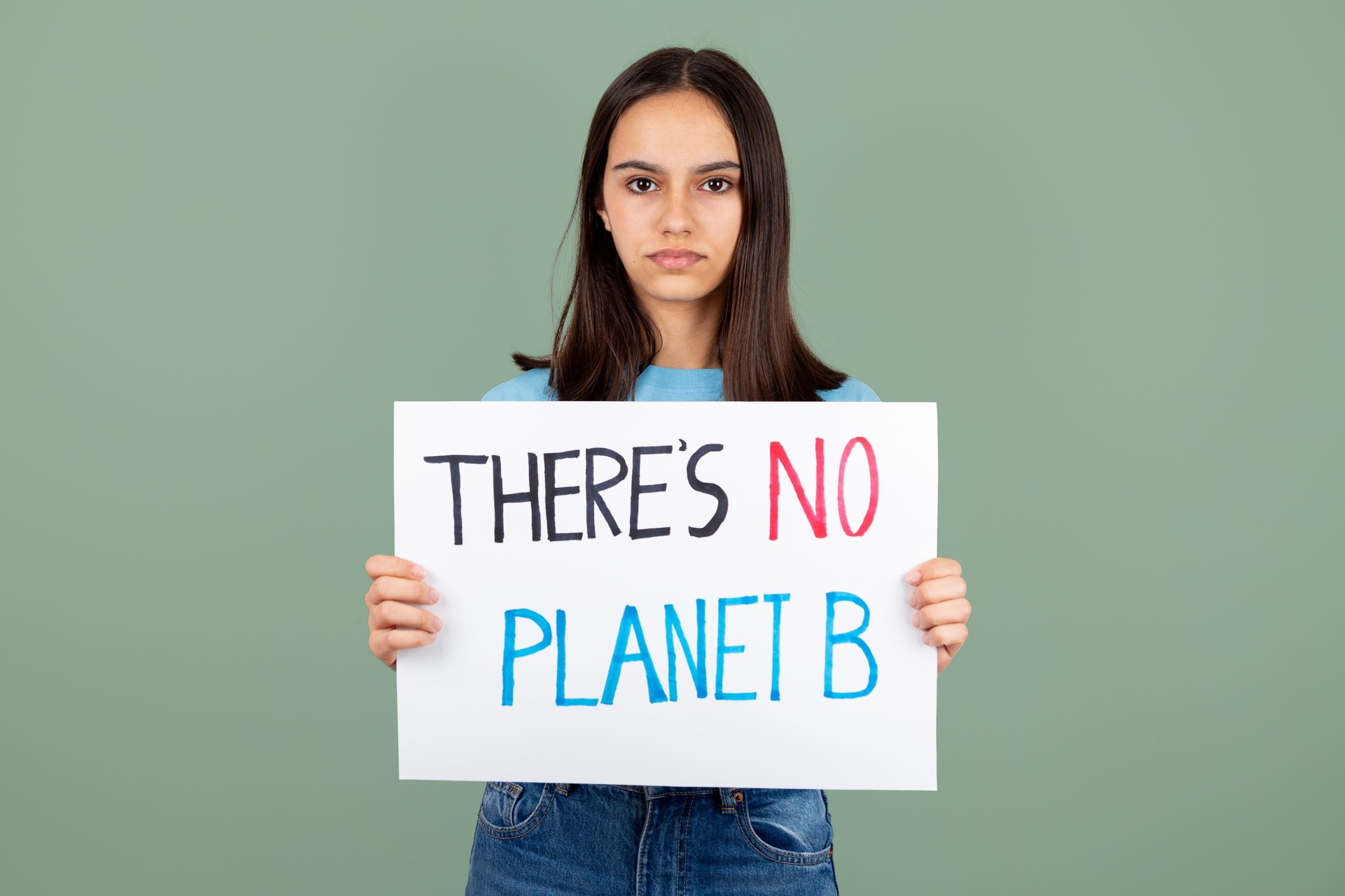 Serious teen girl worried about the future of the planet